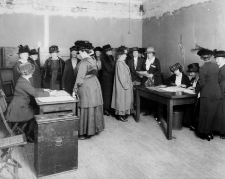 High angle view of a group of suffragettes in an office